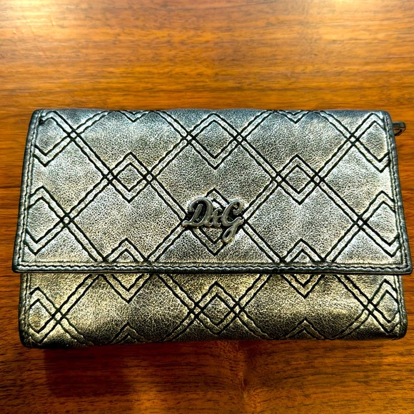 Dolce & Gabbana Handbags - Authentic Dolce & Gabbana wallet - metallic leather with two zipped pockets NWOT